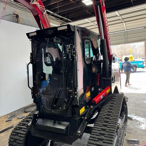 Window tint install: Heavy equipment cab glass